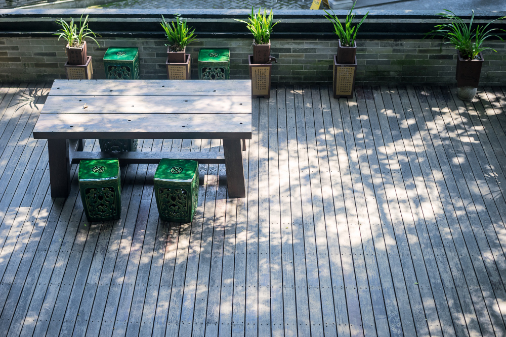 Terrace with wooden table plants